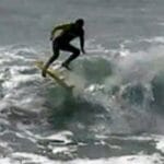 Kickflip auf dem Surfboard